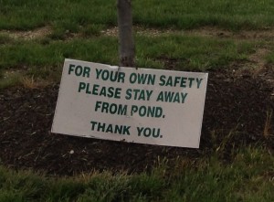 For your own safety please stay away from the pond. Thank you. (Cropped Closeup)