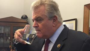 In his congressional office, Rep. Bob Brady, D-Pa., drinks from the glass of water Pope Francis used during his speech to Congress. Stan White/U.S. Rep. Bob Brady's office via AP