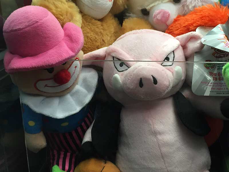 Stuffed Clown and Pig with Bad Intentions